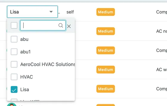 The user column opened on a row, showing the fieldworker list with the assigned one ticked